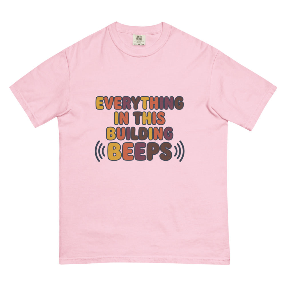 Everything In This Building Beeps tee in Blossom, flat lay