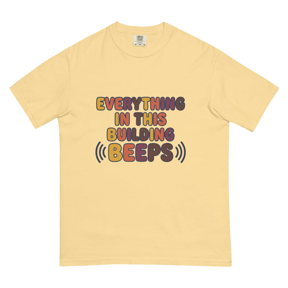 Everything In This Building Beeps tee in Butter, flat lay