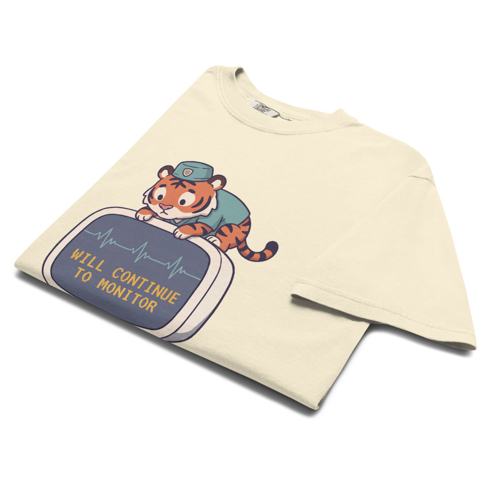 Will Continue to Monitor tee in Ivory, folded